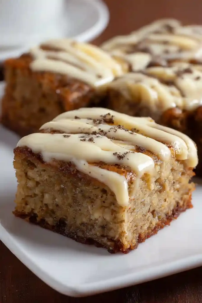 Lifting banana brownies from baking pan using parchment paper